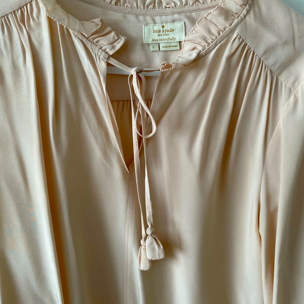 Romantic blush pink blouse.